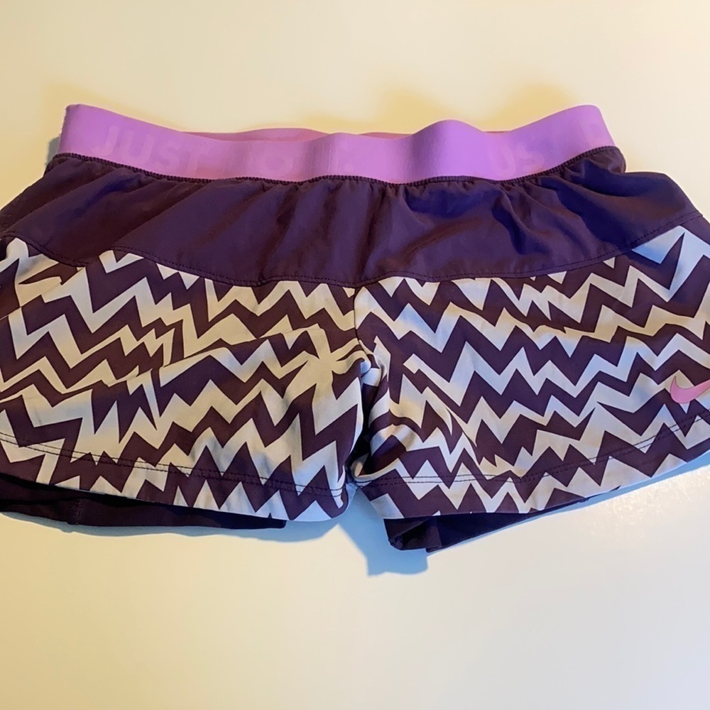 Purple Nike lined running shorts size Medium